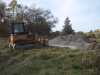 Placing the gravel bed for the floor.