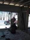 Installing one of the operating windows in the master bedroom